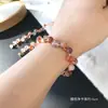 Pulsera de Cristal Flor de Goma Roja Chaoyang Jingyao Hebilla de Beso de Succión Moda Dulce Belleza Viagra Fantasma Pulsera de Círculo Único