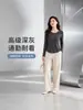 Nuevo top de otoño de punto acanalado con cuello redondo y manga larga, moda simple y elegante, cómoda camiseta básica con dobladillo curvo, color liso para mujer