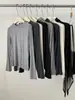 Suave y amigable con la piel, versátil camiseta básica de cuello redondo para mujer, alta elasticidad, corte ajustado y un look sofisticado, camiseta de manga larga para otoño e invierno
