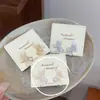 Colección de pendientes de mariposa azul hielo, frescos y etéreos, pendientes para chica delicada, de cristal transparente tipo hada, perla, nicho