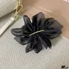 Elegante pinza para el cabello floral estilo francés para mujer, adecuada para coletas y recogidos, con una sensación de alta gama y etérea.