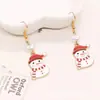 Suministro de comercio exterior traje de aretes navideños aretes de Papá Noel aretes de alce muñeco de nieve guantes calcetines rojos aretes