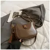 Bolso de Axila de Aspecto Retro de Alta Calidad para Mujer 2025 Nuevo Bolso Cubo Simple Textura de Nicho Hombro Único Cruzado Bolso para Teléfono Móvil
