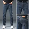 Jeans cropped populares para hombre, nuevo estilo de primavera, elásticos, para personas bajitas, versión coreana, corte ajustado, pantalones de hombre de 9 puntos