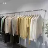 Prateleira de display para loja de roupas cabide de chão cabide de parede para roupas femininas roupas infantis cabide de parede em aço inoxidável cabide de parede com suporte lateral