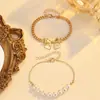Amazon Conjunto de Pulseras de Perlas Cosidas con Colgante de Lazo Grande Joyería Dulce y Linda Venta al por Mayor