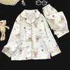 Conjunto de ropa de casa para niños con cuello de solapa, adecuado para primavera y otoño, fino y ligero, cárdigan de manga larga, estilo coreano, pijama de algodón con estampado de nubes para niñas