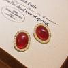 Corea del Sur otoño e invierno venta caliente perla roja diamante exquisito temperamento Joker pendientes de botón franceses al por mayor