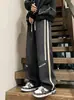Nuevos pantalones casuales de otoño e invierno para hombre, marca de tendencia estilo americano, pantalones holgados de pierna recta, pantalones largos deportivos versátiles de pierna ancha, ropa para hombre