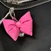 Llavero Creativo Coreano Dongdaemun de Tela de Cuero con Lazo y Corazón Decoración para Llavero de Coche y Bolso Colgante Versátil