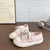 Tênis de lona estilo americano retrô com estrelas para mulheres, novo modelo versátil outono 2026, tênis casual estudantil, sapatos brancos