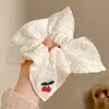 Goma para el pelo con estampado de leopardo marrón para otoño e invierno para mujer, scrunchie elegante y sofisticado para peinados de moño