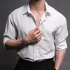 Venta al por mayor de fábrica Casual de moda para hombre Estilo Primavera y Otoño Simple Color Sólido Textura Rayada Estilo Británico Moda Camisa Cardigan