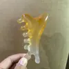 Pente de Massagem Multifuncional Quatro em Um para Couro Cabeludo, Pente de Meridianos, Pente de Resina para Raspagem de Pontos de Acupuntura, Pente Pequeno de Golfinho Rosa, Fornecimento Direto da Fábrica