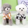 Ropa Nueva para Mascotas para Perros Pequeños: Ropa con Patrón de Tablero de Ajedrez para Perros Pomerania y Perros Tipo Teddy, Estilo Delgado Primavera/Verano, Camisa con Patrón de 23 Cuadros y Cara Sonriente