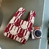 Bolsa Tote de Tricô Nova Tendência Design Original Armazenamento Moda Versátil Bolsa de Mão Pequena para Mulheres