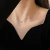 Colar Exquisito Encaixável para Mulheres, Simples e Fashion, Pingente de Anel Duplo Personalizado, Design de Nicho, Corrente de Clavícula de Camada Dupla