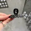Clip Pequeño de Garra de Cristal Negro Ultra Brillante Modelo Nuevo 2026, Accesorio Versátil de Moda Lujo Ligero para el Cabello, Pinza para el Cabello Estilo Coreano para la Parte Posterior de la Cabeza