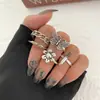 Anillo de mariposa negro esmaltado con forma de corazón oscuro para Halloween, juego de nueve anillos estilo punk de araña