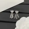 Nuevos Pendientes Dior Vintage con Borla y Pedrería CD para Mujer 2025, Aguja de Plata, Estilo Lujoso de Gama Alta, Pendientes de Disparo Real al por Mayor