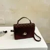 Bolso de mano para mujer con estampado de escamas de pez, nuevo bolso de moda 2026 de cuero brillante, bolso tote pequeño DF, bolso de hombro y bolso cruzado de alta gama y elegante