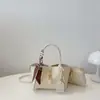 Bolso de Mano Versátil Texturizado para Mujer 2025 Nueva Moda Simple de Alta Gama Bolso de Hombro Elegante para Ir al Trabajo Bolso Balde