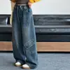 Calça jeans feminina primavera e outono 2026 nova casual estilo coreano com bolso lateral calça de trabalho jeans para crianças maiores moderna