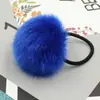 Anillo para el pelo de bola de pelo de imitación de conejo multicolor coreano al por mayor explosiones de Taobao fábrica directa de tocados accesorios para el cabello cuerda para tocado