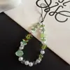 O Novo Design de Flor Verde é Adequado para Cordões de Celular, Bolsas, Pingentes de Chave de Carro e Acessórios para Capa de Fone de Ouvido AirPods