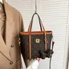 Bolso de mujer de alta gama transfronterizo 2026 nuevo bolso tipo cesta con estampado floral vintage bolso de mano versátil bolso de hombro cruzado
