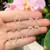 Pendientes de joyería transfronterizos, pendientes apilables de moda europea y americana con forma de estrella y luna incrustados de diamantes, pendientes, venta directa del fabricante