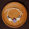 Jingdezhen Navidad Pulsera de Cuerda Trenzada de Cerámica Pulsera de Trébol de Cuatro Hojas Joyería Artística Hecha a Mano Venta al por Mayor Pulseras de Cerámica para Atracciones Turísticas