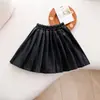 Direto do Fabricante: Saias Plissadas para Meninas Outono/Inverno 2026, Saias Plissadas Infantis, Saias Curtas de Couro PU Estilo Escolar para Meninas, Atacado