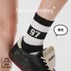Meias Listradas Casuais para Esportes Outono Inverno Femininas Sem Costura Meia-Panturrilha Femininas Estilo Coreano Color Blocking Antibacterianas Resistentes ao Odor Meias da Moda Transfronteiriças