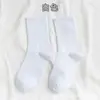 Meias Coloridas Sólidas da Moda Femininas Casal Europeias e Americanas Meias para Corrida Esportiva Meias da Moda Masculinas de Cano Médio Meias Longas de Outono e Inverno