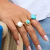 Anel de Aço Titânio Wanxing Europeu e Americano Transfronteiriço com Incrustação de Turquesa Azul, Joia de Aço Inoxidável Dourado 18K, Não Desbota, Design Estiloso
