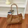 Bolso de moda para mujer con patrón tejido europeo y americano transfronterizo 2026 simple y elegante para el trabajo y el trayecto, con textura, de hombro, bajo el brazo, tipo tote
