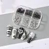 FULL BEAUTY Nueva Caja Transfronteriza de 6 Compartimentos Punk Negro y Plateado Remache Cabeza de Bala Accesorios 3D para Uñas