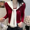 Primavera y Otoño 2025 Color de Contraste Cuello en V Real de Dos Piezas Empalmado Chal Cuello Azul Marino Camiseta de Manga Larga para Mujer Cintura Delgado Aspecto Top de Moda