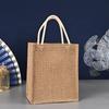 Fábrica tiene una bolsa de lino para compras con fondo, logotipo personalizado, publicidad de película, portátil, imitación yute, con hebilla oculta