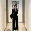 Traje deportivo casual de alta gama estilo europeo, temperamento de otoño, adelgazante, top negro de manga larga, pantalones de pierna ancha, conjunto de dos piezas, moderno