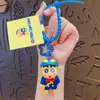 Llavero Original de Muñeca Pequeña Nueva Serie de Crayones de Dibujos Animados Accesorios Colgantes para Bolsos de Pareja Llavero de Coche Regalo Venta al por Mayor