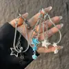 Moda estilo coreano estilo ins cadena de hueso de serpiente estrella correa para teléfono llavero colgante para bolso de cámara CCD para niñas
