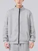 Nuevo conjunto de algodón con cremallera, cárdigan con cuello alto forrado de polar, pantalones de chándal de corte holgado, chaqueta engrosada para otoño e invierno, pantalones deportivos tipo jogger para hombre