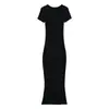 Chica sexy picante muestra figura vestido largo de un solo paso para mujer verano nuevo elástico ajustado cuello trapezoidal manga corta vestido de cadera