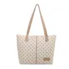 La popular bolsa de mano dulce de este año para mujer, nuevo estilo Otoño 2026, bolso de hombro único con estampado de lunares, bolso versátil para debajo del brazo
