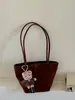 Bolsa de bowling coreana de nicho em formato de coração para mulheres, nova bolsa tote transversal simples e versátil 2026, bolsa de mão para o dia a dia