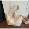 Bolsa de Ombro Versátil Nova Moda 2026 Grande Capacidade Simples e Moderna Transfronteiriça com um Estilo Preguiçoso e Elegância Casual Bolsa de Mão