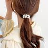 Anillo de pelo de perla de alta calidad, cuerda para el cabello, banda de goma pequeña coreana simple, pulsera para el cabello, cuerda para el cabello de doble propósito, accesorios para el cabello al por mayor