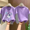 Camiseta de manga larga para niño 2026 nuevo modelo, camiseta básica de dibujos animados para niño, camiseta interior de algodón puro a rayas para otoño, estilo primavera y otoño